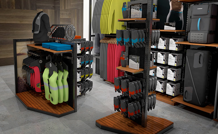 Merchandising display inside a retail store with sports gear, shoes, and accessories arranged on racks and shelves.