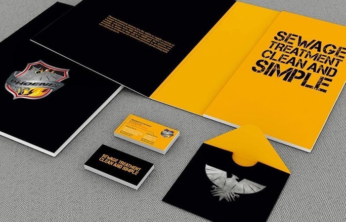 Branded business cards, brochures, and print collateral arranged flat, highlighting 54blue’s brand identity printing services.