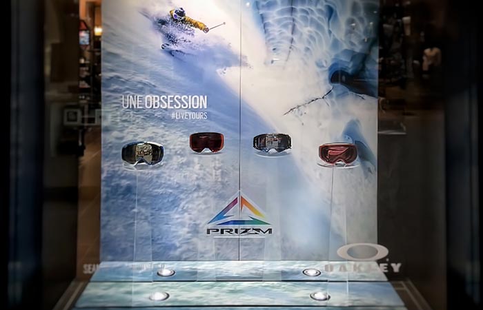 Storefront window graphic featuring a skier, demonstrating 54blue’s creative window front print solutions